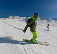 A man skiing on a piste in Chamonix