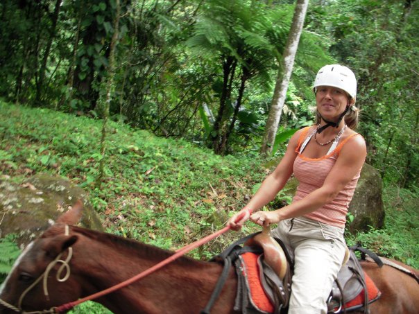 Photo of Julie riding a horse