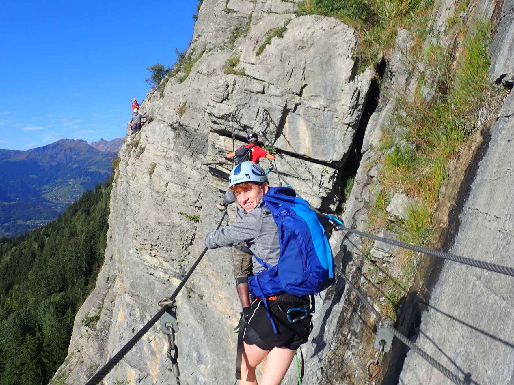 People walking along the Via Ferrata in the Lake District